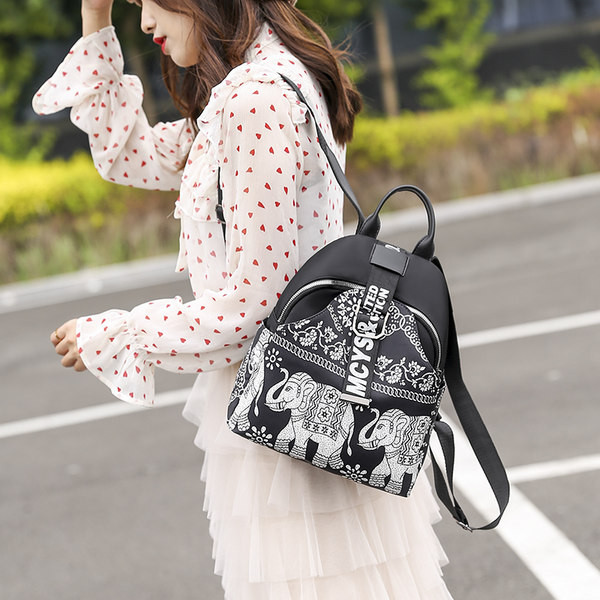 Naiste tekstiilist värvilise mustriga seljakott