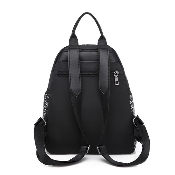 Naiste tekstiilist värvilise mustriga seljakott