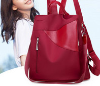 Γυναικείο σακίδιο πλάτης με φερμουάρ μπροστά σε τρία χρώματα