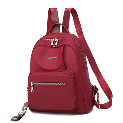 Naiste vabaaja tekstiilist seljakott esitaskuga