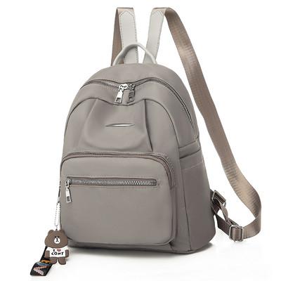 Naiste vabaaja tekstiilist seljakott esitaskuga