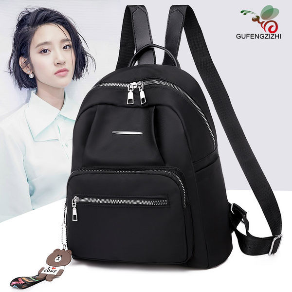 Naiste vabaaja tekstiilist seljakott esitaskuga