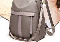 Kolmes värvitoonis sangadega naiste seljakott