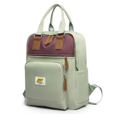 Naiste seljakott tekstiilist esitaskuga