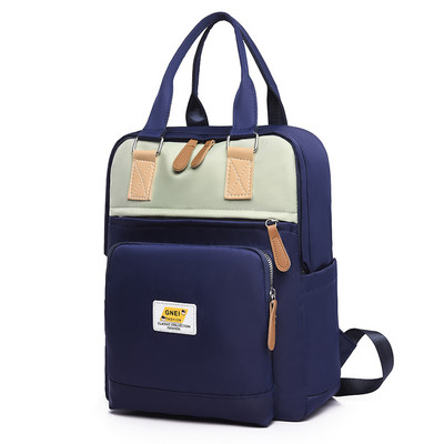 Naiste seljakott tekstiilist esitaskuga