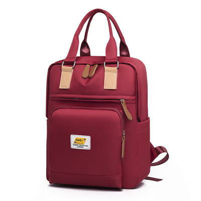 Naiste seljakott tekstiilist esitaskuga