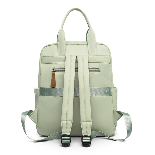 Naiste seljakott tekstiilist esitaskuga