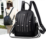 Naiste musta värvi kividega nahast kott