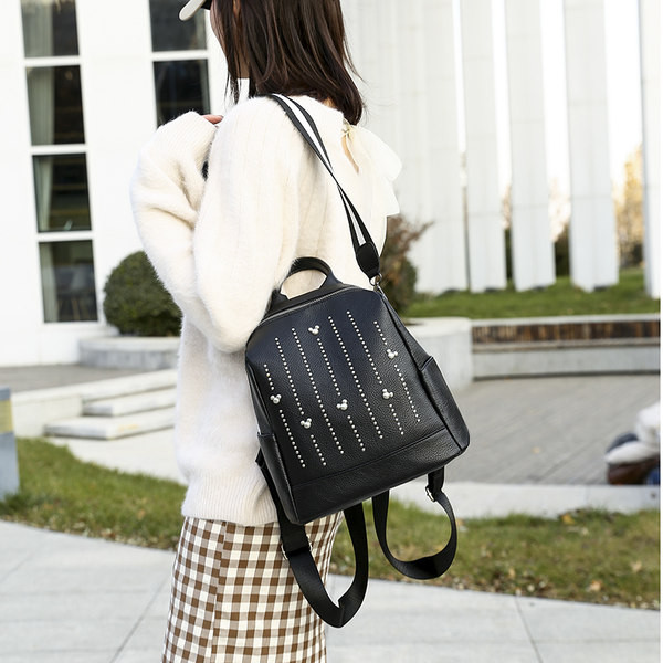 Naiste musta värvi kividega nahast kott