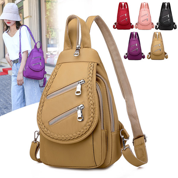 Naiste nahast kott ees lukuga mitmes värvitoonis