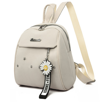 Naiste kaasaegne metallelemendi ja lukuga seljakott