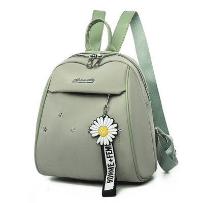 Naiste kaasaegne metallelemendi ja lukuga seljakott