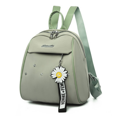 Naiste kaasaegne metallelemendi ja lukuga seljakott