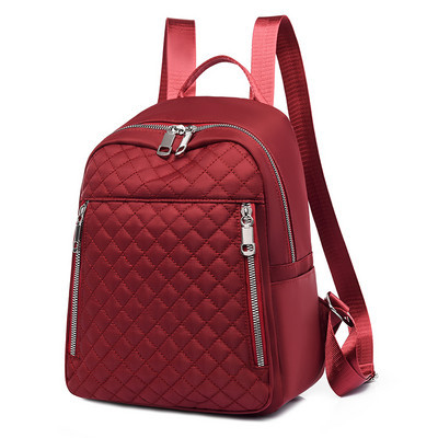 Stiilne naiste seljakott, mis on valmistatud tekstiilist lihtsast mudelist