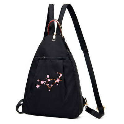 Naiste igapäevane tikandiga seljakott - musta värvi