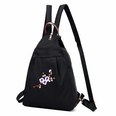 Naiste igapäevane tikandiga seljakott - musta värvi