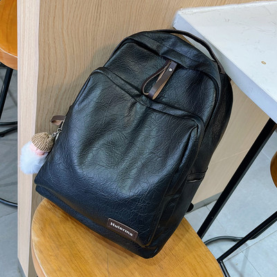 Női alkalmi bőr hátizsák kulcstartóval