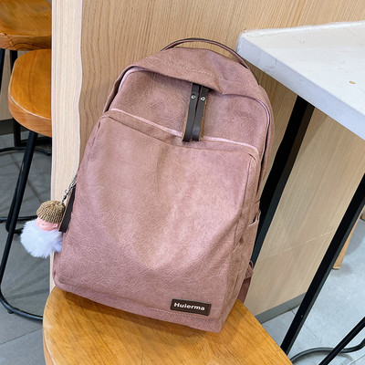 Női alkalmi bőr hátizsák kulcstartóval