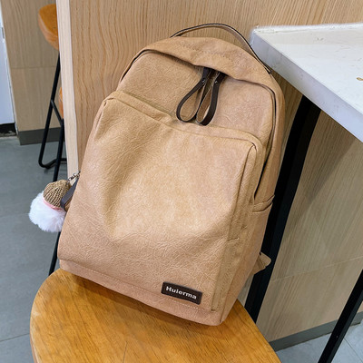 Női alkalmi bőr hátizsák kulcstartóval