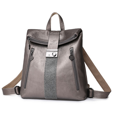 Γυναικείο σακίδιο πλάτης από οικολογικό δέρμα με μεταλλικό κούμπωμα και διακόσμηση