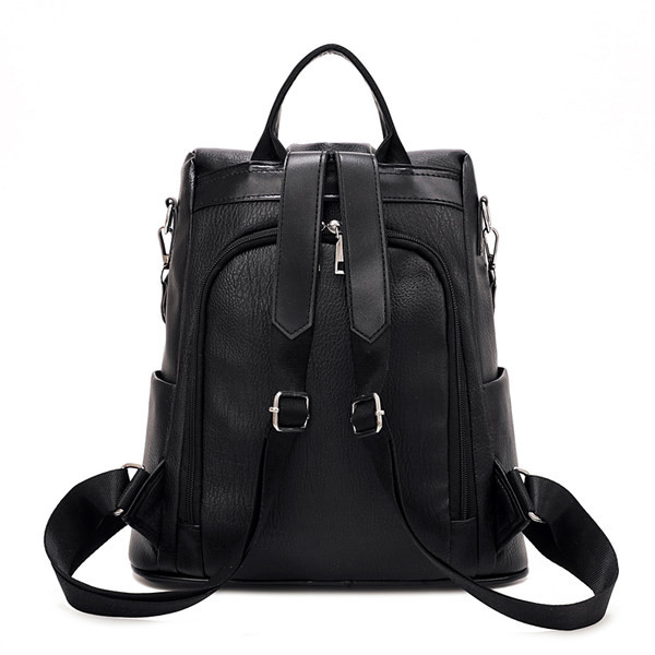 Naiste musta ja valge nahast seljakott