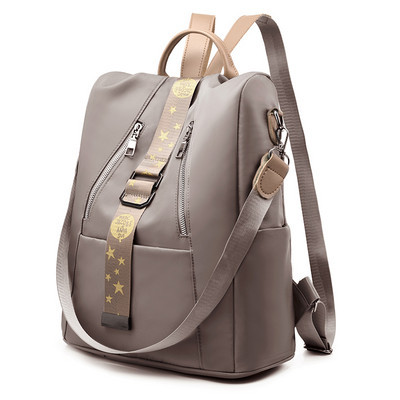 Naiste moodne tekstiilist seljakott eesmise luku ja taskuga