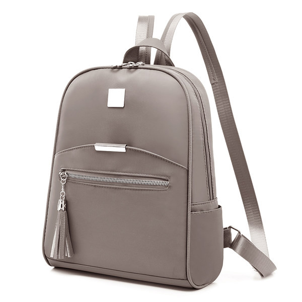 Női bőrtáska cipzárral és medállal három színben