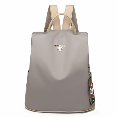 Igapäevane metallelemendiga seljakott - mitut värvi