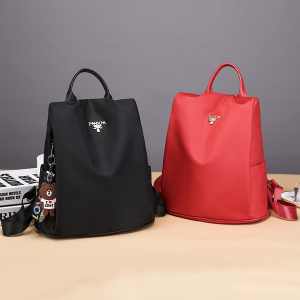 Igapäevane metallelemendiga seljakott - mitut värvi