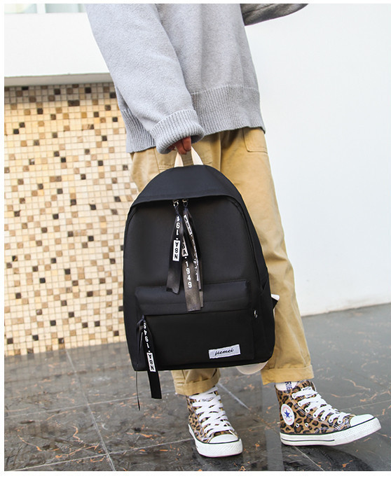 Modern iskolai textil hátizsák elülső zsebbel