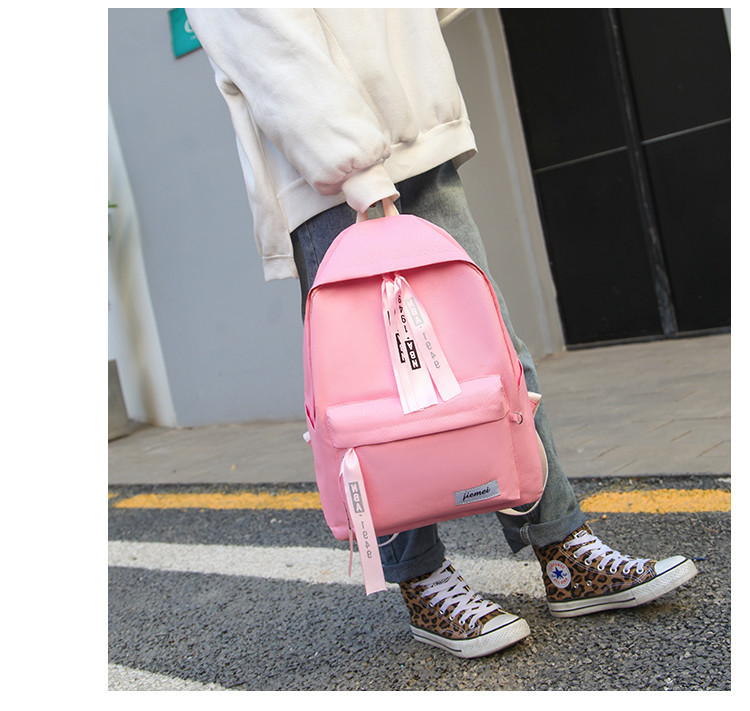 Modern iskolai textil hátizsák elülső zsebbel