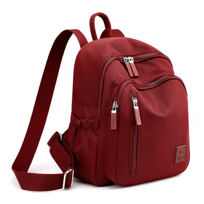 Naiste tekstiilist metallist kinnitusega seljakott