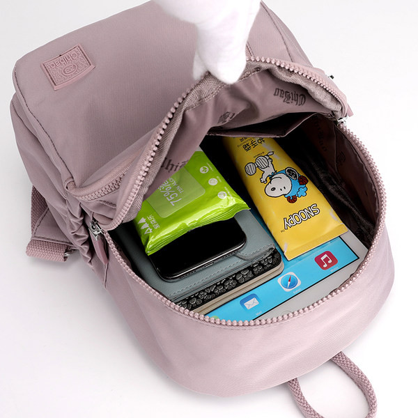 Naiste tekstiilist metallist kinnitusega seljakott