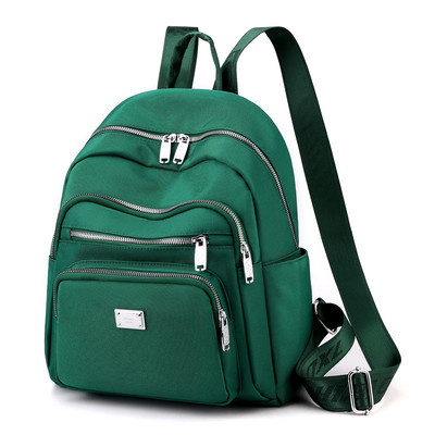 Metallist kaunistusega tekstiilist seljakott naistele