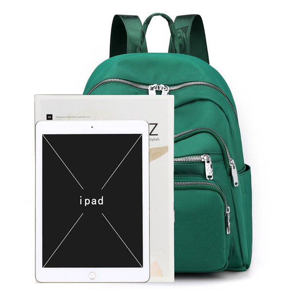 Metallist kaunistusega tekstiilist seljakott naistele