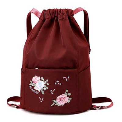 Tikandiga naiste tekstiilist kott - mitut värvi