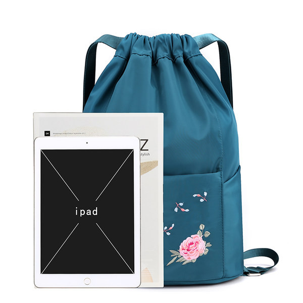 Tikandiga naiste tekstiilist kott - mitut värvi