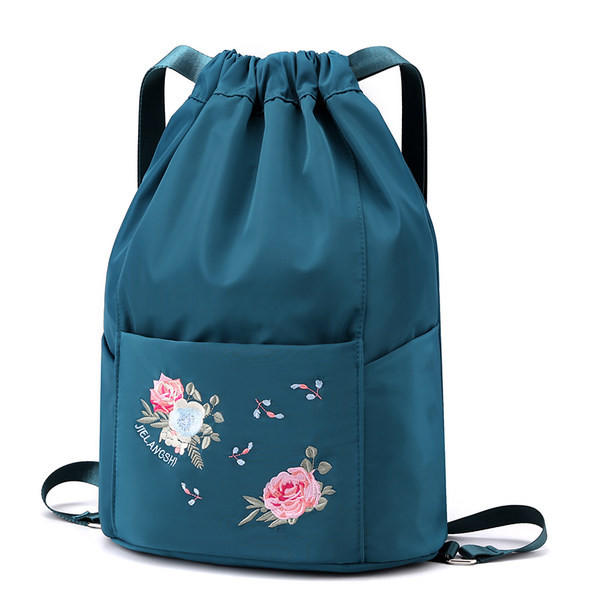 Tikandiga naiste tekstiilist kott - mitut värvi