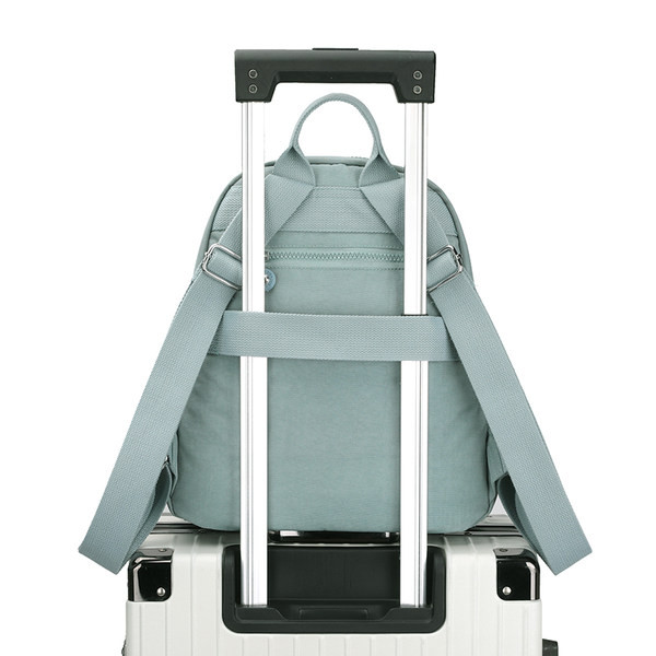 Tekstiilist veekindel seljakott mitmes värvitoonis