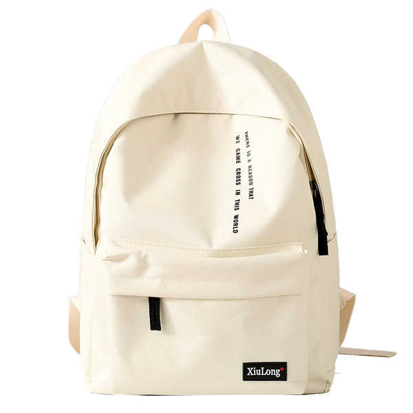 Igapäevane tekstiilist seljakott kirjadega