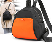 Naiste mini igapäevane seljakott tekstiilist ja metallist elemendiga