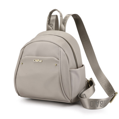 Naiste mini igapäevane seljakott tekstiilist ja metallist elemendiga