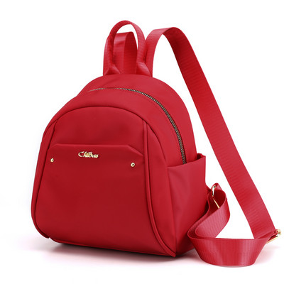 Naiste mini igapäevane seljakott tekstiilist ja metallist elemendiga