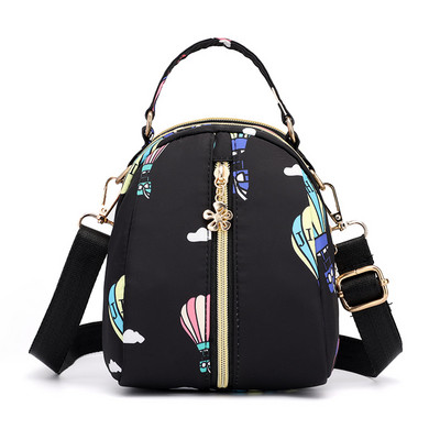 Naiste tekstiilist seljakott värvilise aplikatsiooniga