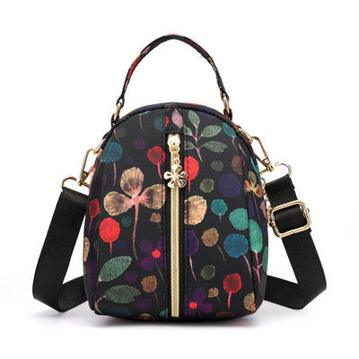 Naiste tekstiilist seljakott värvilise aplikatsiooniga