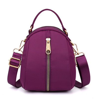 Naiste tekstiilist seljakott värvilise aplikatsiooniga