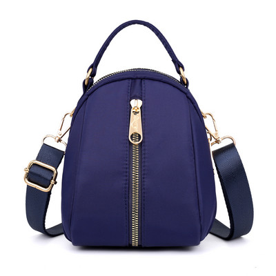 Naiste tekstiilist seljakott värvilise aplikatsiooniga