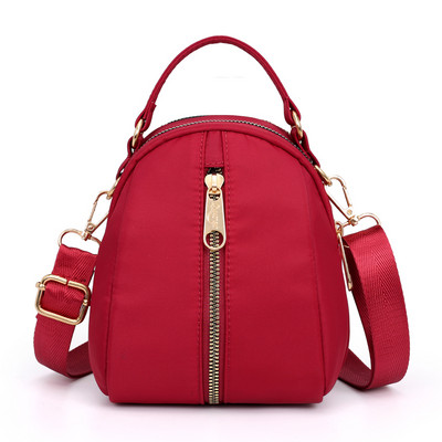 Naiste tekstiilist seljakott värvilise aplikatsiooniga