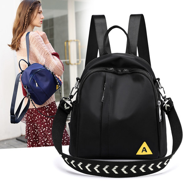 Naiste tekstiilist seljakott eesmise lukuga