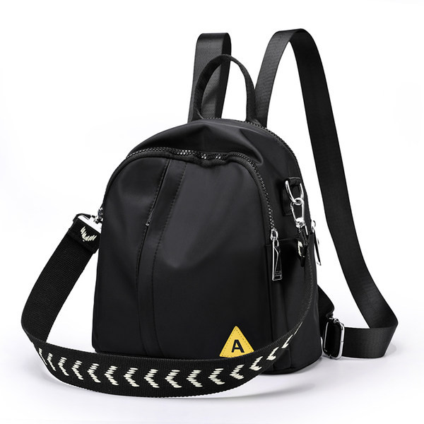 Naiste tekstiilist seljakott eesmise lukuga